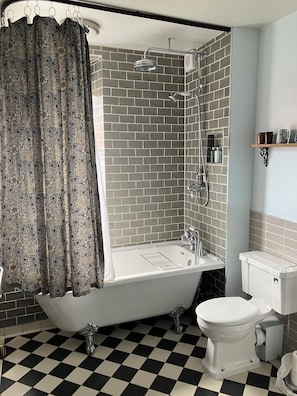 Deluxe Plus Double Room | Bathroom | Combined shower/tub, free toiletries, hair dryer, towels