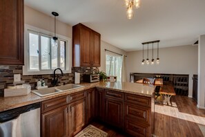 Microwave, stovetop, dishwasher, coffee/tea maker - Loveland Home w/ Private Hot Tub + Wood Fireplace! (Loveland)