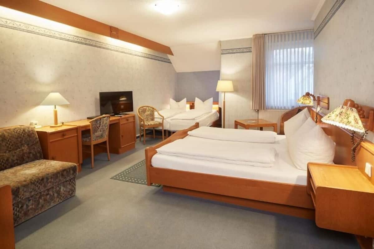 Habitación cuádruple | Wifi gratis y ropa de cama