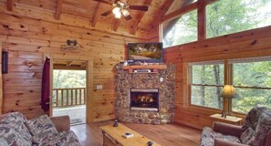 TV, fireplace - PetFriendlyRealLogCabinSleeps6WIfiHotTubFreeFishing (Sevierville)