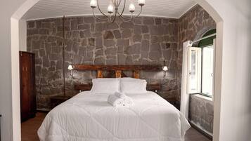 Exclusive Suite, 1 Queen Bed with Sofa bed, Air conditioning | Bathroom | Shower, hair dryer, bathrobes, towels