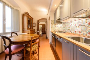 Comfort Apartment | Private kitchen | Full-size fridge, microwave, oven, stovetop