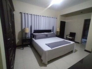 2 dormitorios, tabla de planchar con plancha, wifi gratis y ropa de cama