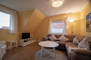 TV - Wat Moi 3 - Dachgeschoss Ferienwohnung für 4 Personen (Borkum)