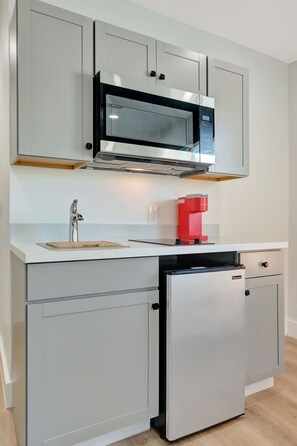 Fridge, microwave, stovetop, coffee/tea maker
