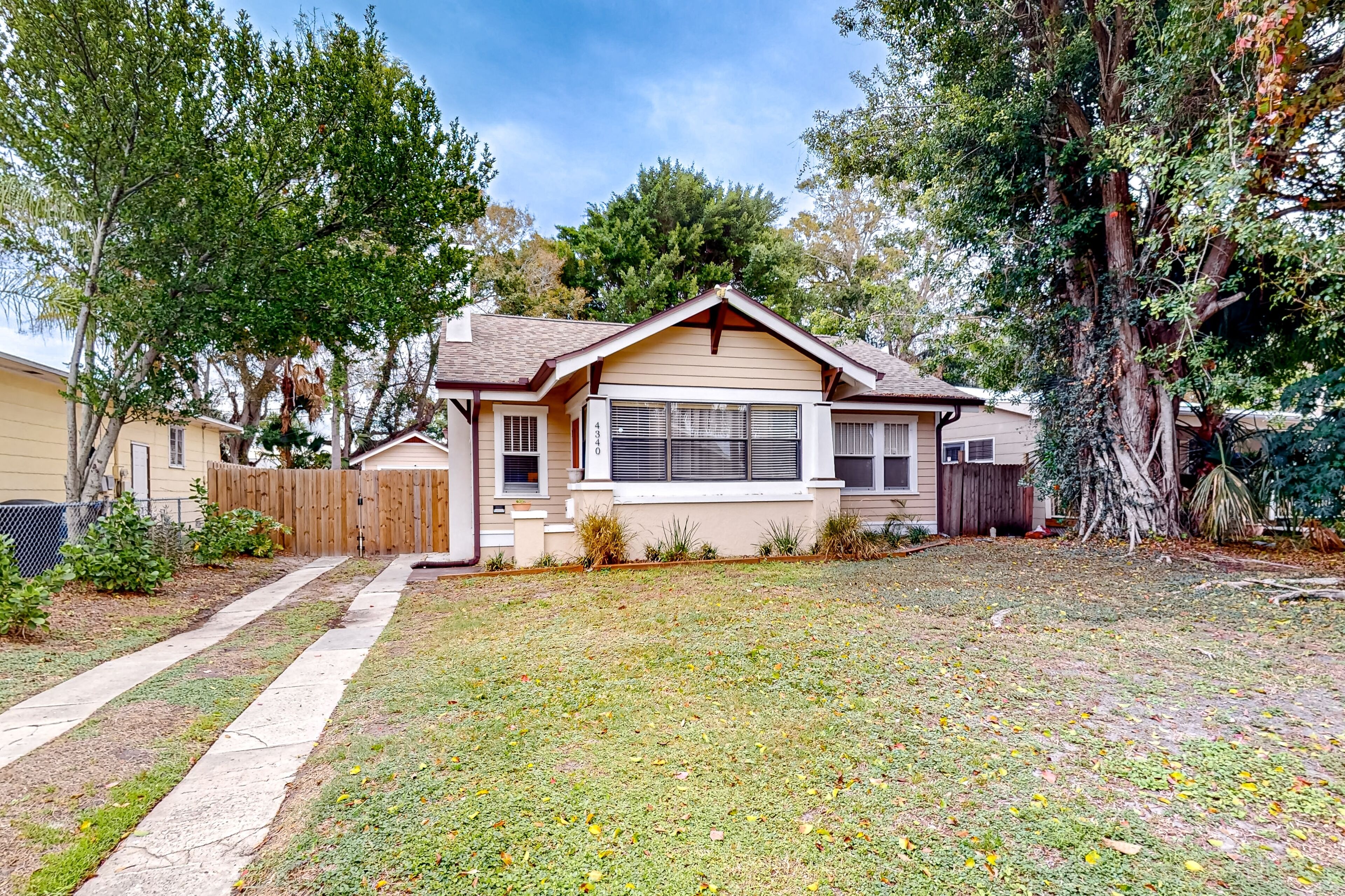 Dog-friendly Craftsman with fenced yard, firepit, deck, & updated interior