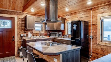 Deluxe Cabin | Private kitchen | Full-sized fridge, microwave, oven, stovetop