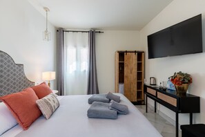 1 dormitorio, tabla de planchar con plancha, wifi gratis y ropa de cama