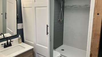 Shower, towels, soap, shampoo