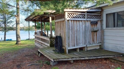 Lake Front cabin on ORV trail head! 5 mins from AuSable River pets welcome!
