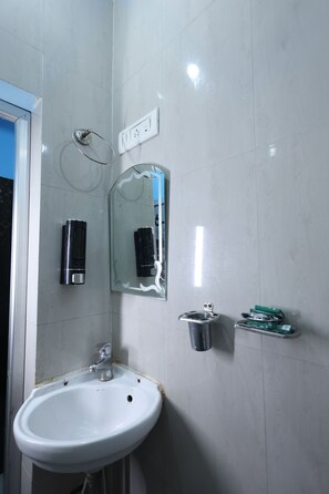 Room | Bathroom | Hair dryer, slippers, towels, soap - ANAND LOK VARANASI  (Varanasi)