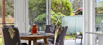 Tucked away but central to shops, restaurants, cafes, pub, clubs, is our modern contemporary house.