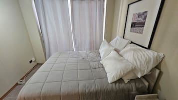 Blackout drapes, iron/ironing board, free WiFi