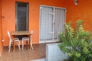 Outdoor dining - Ocean View Apartment B with AC (Bridgetown)