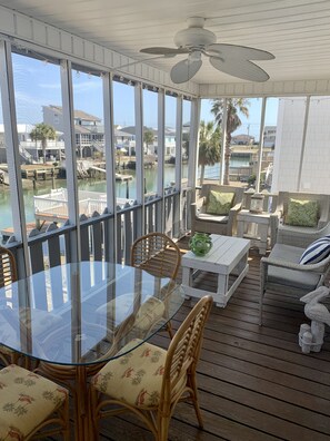 Outdoor dining - New Pool + Putting Green, Walk to Beach, Waterfront Home in Cherry Grove! (North Myrtle Beach)