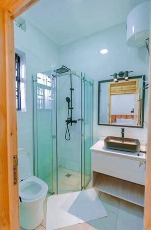 Hair dryer, towels, soap, shampoo