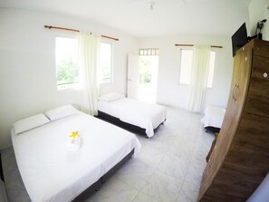 Classic Quadruple Room | Bed sheets - Hotel Campestre Mastranto (Villavicencio)