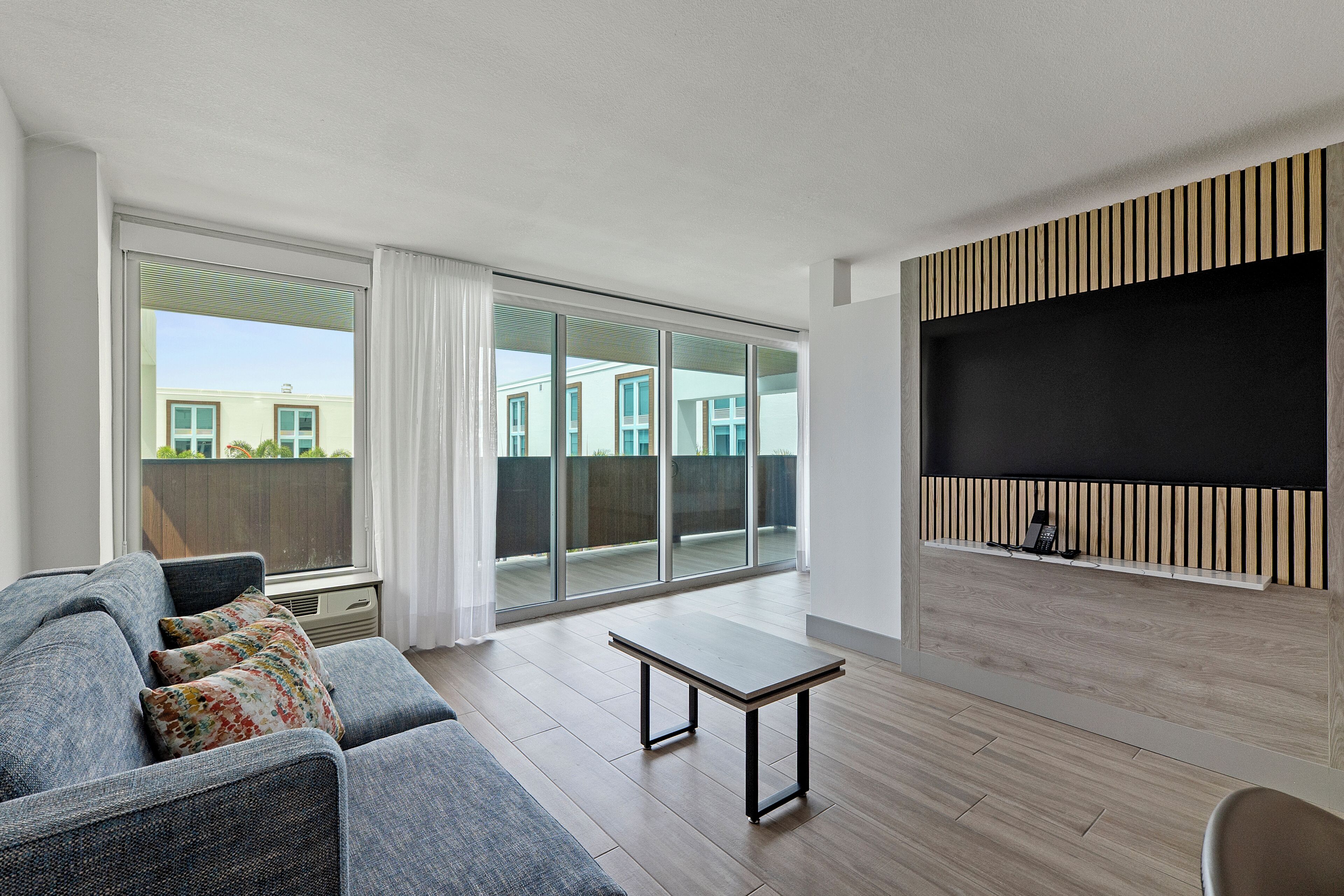 Suite, 1 King Bed with Sofa bed, Balcony | Living area | 55-inch Smart TV with cable channels, Netflix, pay movies