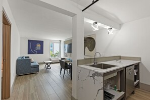 Apartment, 1 King-Bett und Schlafsofa, Kochnische | Wohnbereich