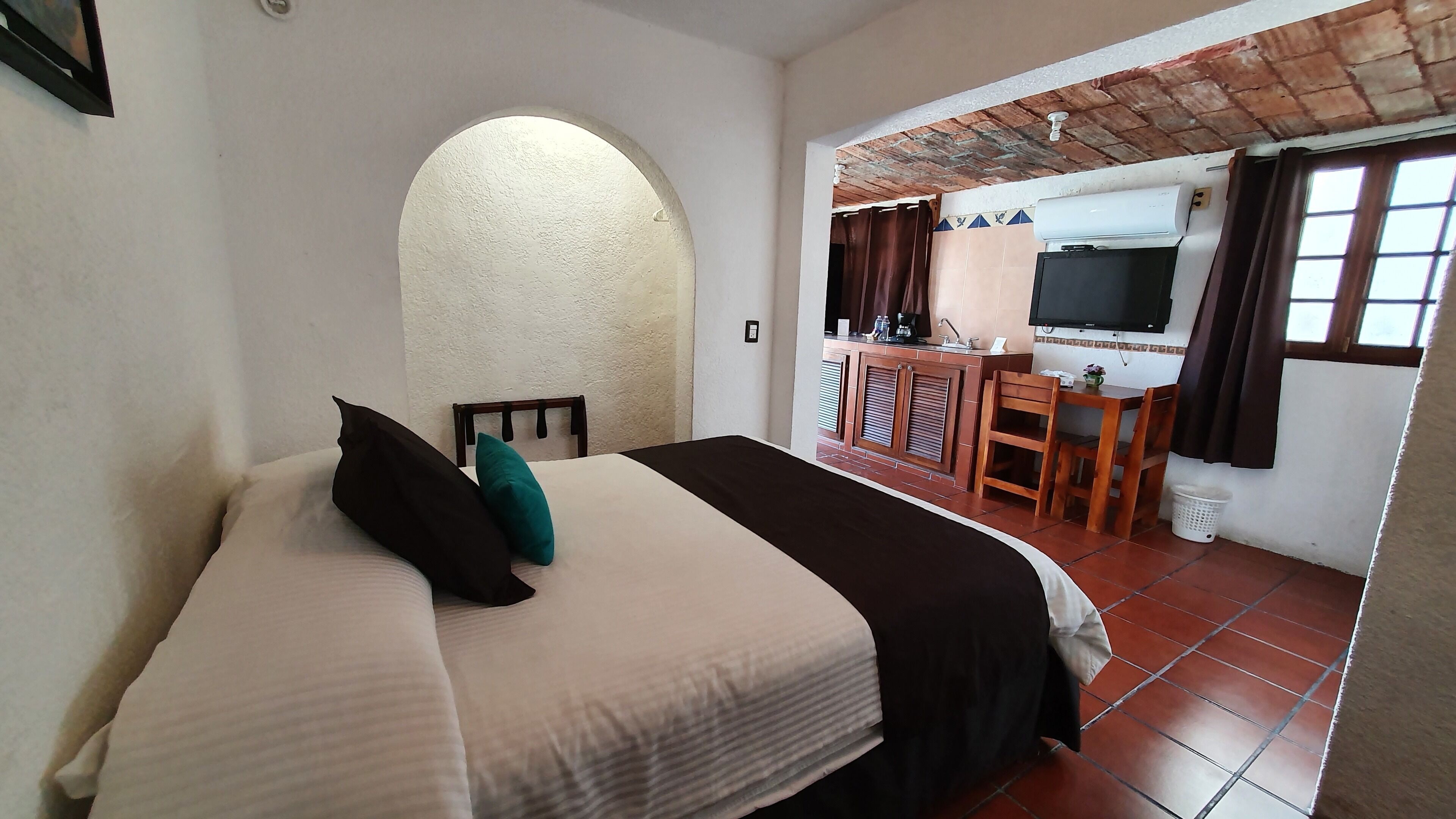 Economy Double Room | Minibar, desk, laptop workspace, blackout curtains