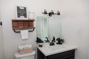 Hair dryer, towels, soap, shampoo