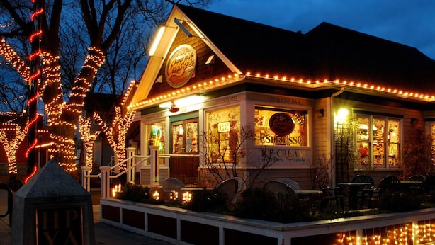 A building with a sign reading 'Espresso Bar' and 'Ice Cream & Frozen Desserts.' - Clyde's Crib: Cozy Ms. Pac-Man (Boise)