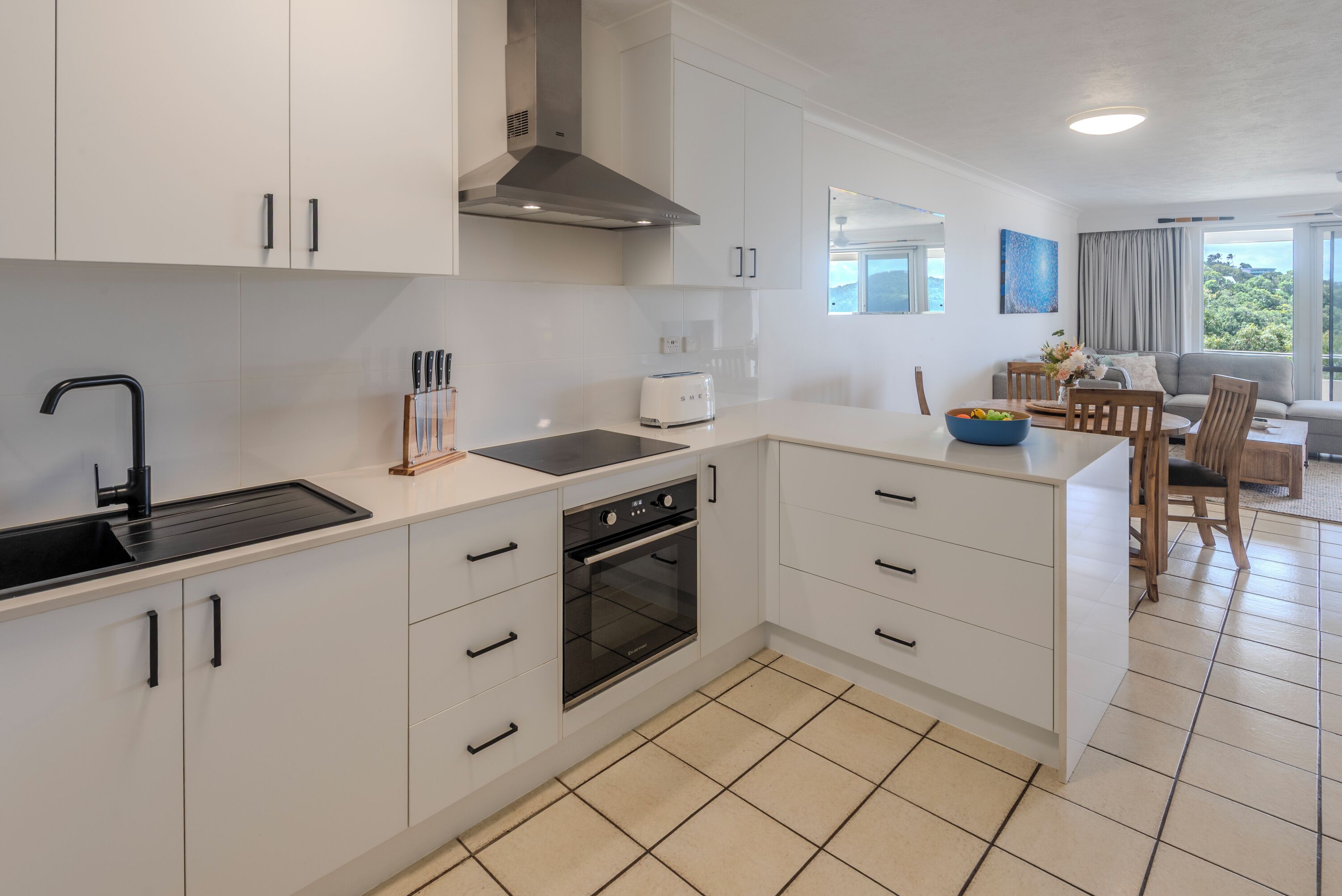 Coffee/tea maker, oven, stovetop, high chair