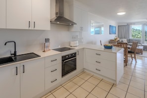 Coffee/tea maker, oven, stovetop, high chair