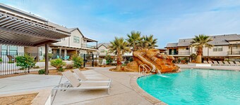 Enchanting townhome with pool, hot tub, fire pit, games, & great balcony views