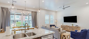 Enchanting townhome with pool, hot tub, fire pit, games, & great balcony views