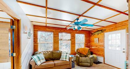 Dog-friendly lakefront getaway with a firepit, large deck, & washer/dryer