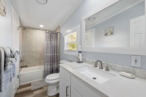 Hair dryer, towels, soap, shampoo