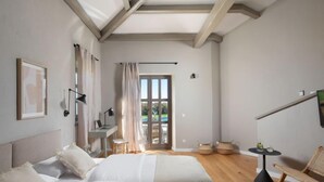 A bedroom with two beds, a desk, a chair, and a table with a lamp. - Vacation home Seseli by Interhome (Poreč/Sv. Lovreč)