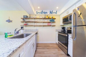 Fridge, microwave, oven, stovetop - Beachside Living at Ponce Landing 50 (St Augustine)