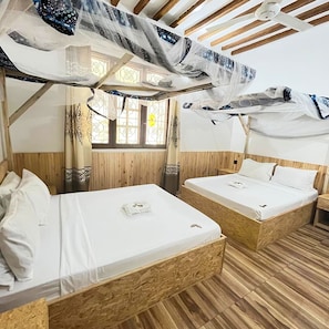 Standard Quadruple Room | Premium bedding, free WiFi, bed sheets