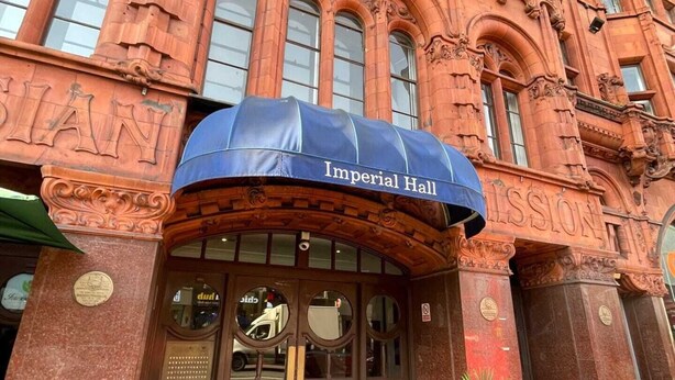 A building with ornate architectural details and a blue awning labeled "Imperial Hall." - Stunning 3BD Maisonette W/balcony - Old Street! (London)
