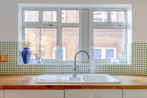 Apartamento básico | Banheiro | Secador de cabelo, toalhas de banho, sabonete, shampoo