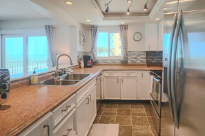 Fridge, microwave, dishwasher, coffee/tea maker