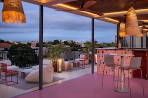 3 bars/lounges, rooftop bar