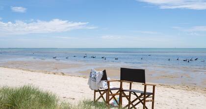 The Leaning Tree - Little blue beach house and beach-box on the bay