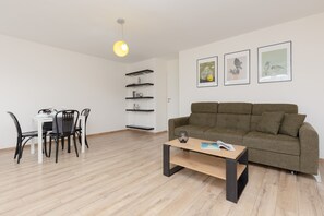 Apartamento, 1 quarto, sacada | Sala de estar