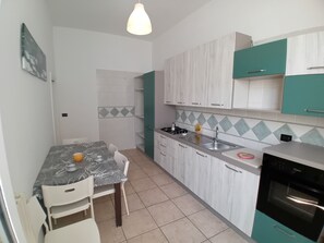 Apartment | Private kitchen | Full-size fridge, oven, stovetop, cookware/dishes/utensils - Corso Roma Apartament Gallipoli (Gallipoli)
