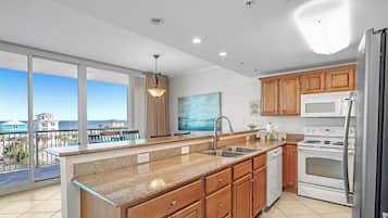 Signature Apartment, 3 Bedrooms, Balcony, Beach View | Private kitchen | Fridge, microwave, oven, stovetop