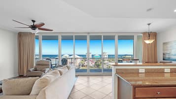 Signature Apartment, 3 Bedrooms, Balcony, Beach View | Living room | 50-inch Smart TV with cable channels