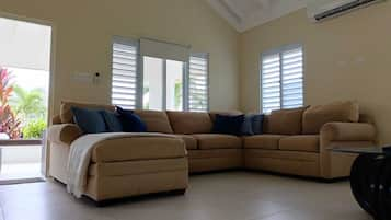 Family Villa | Living area | Flat-screen TV