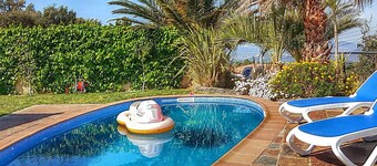 Spacious villa with private pool, parking, and air conditioning