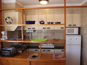 Private kitchen - GIRASOL 1 º - Apartamento luminoso con vistas a la playa de Grifeu. (Llançà)