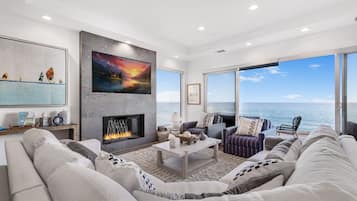 Luxury House, Multiple Beds, Patio, Ocean View (Escondido Escape) | Living area | 65-inch flat-screen TV with digital channels, TV, fireplace