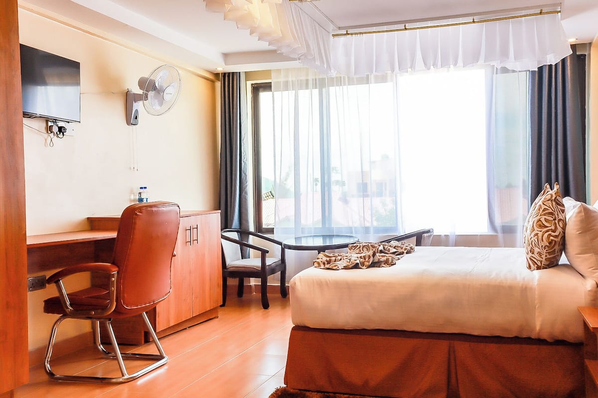 Deluxe kamer, uitzicht op meer | 1 slaapkamer, gratis wifi