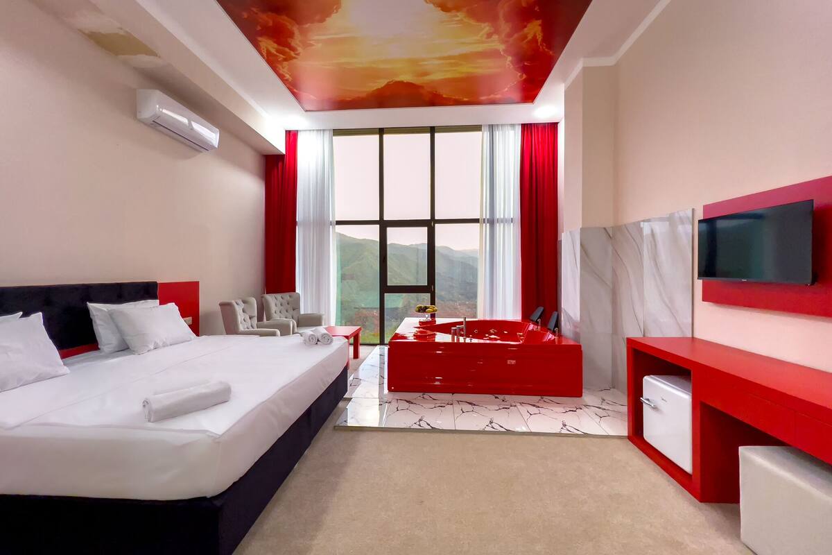Luxury Suite | Frette Italian sheets, premium bedding, Select Comfort beds, desk